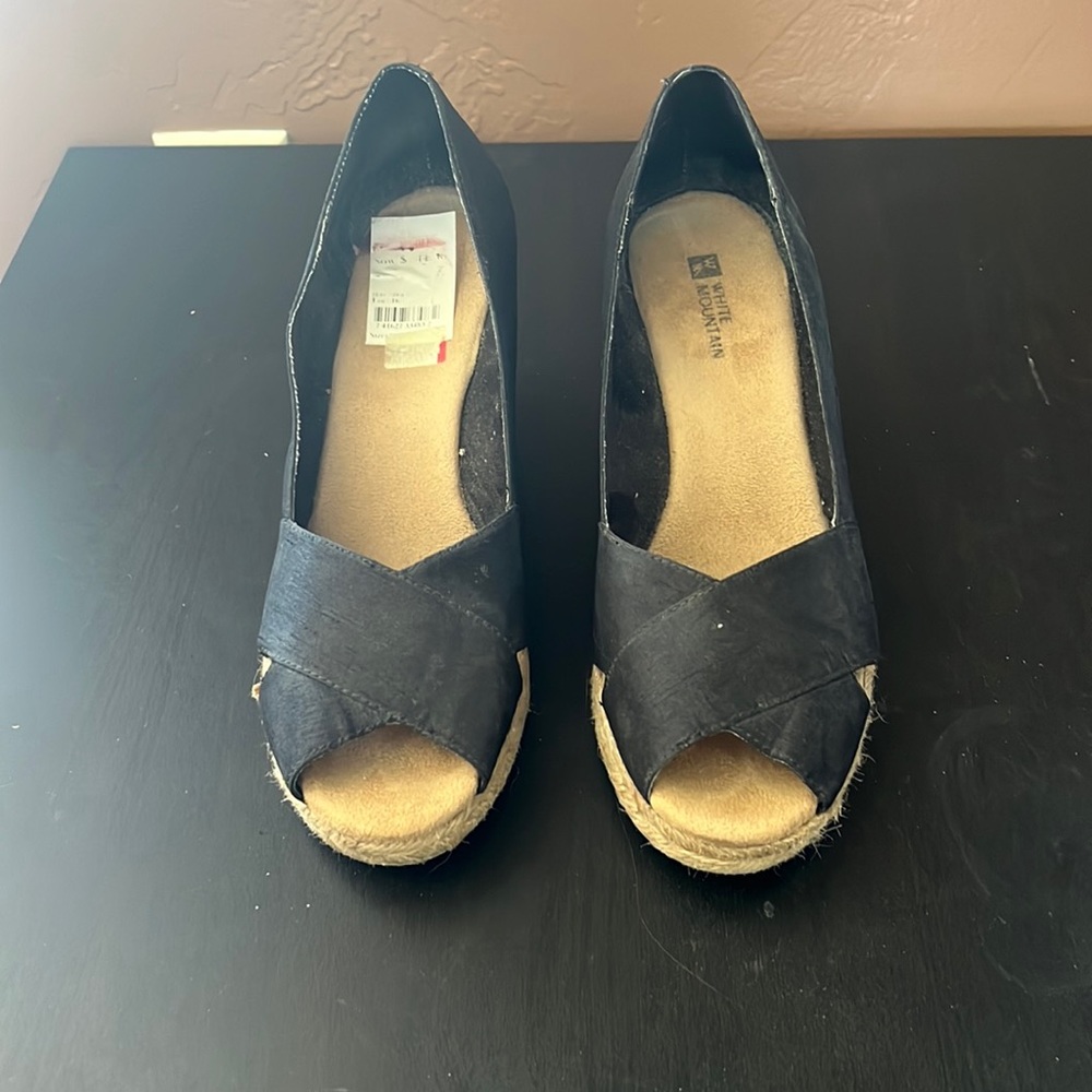 Selling old shoes.